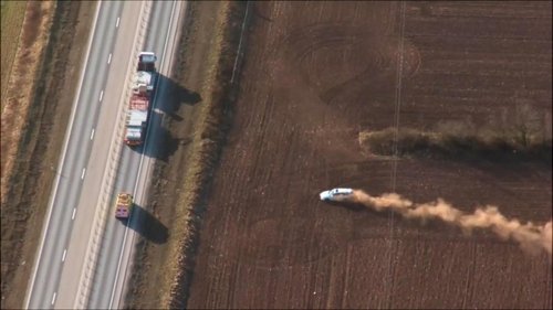 Background image for Car chase in a field