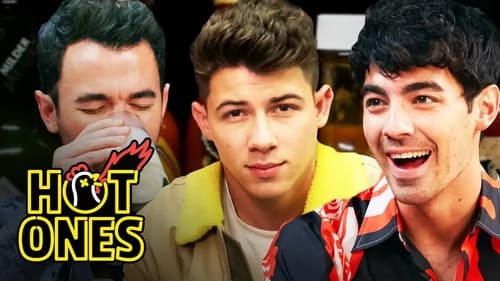 The Jonas Brothers Burn Up While Eating Spicy Wings