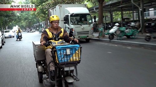 Background image for The "Voiceless Knights" Delivering Food: Chengdu, China