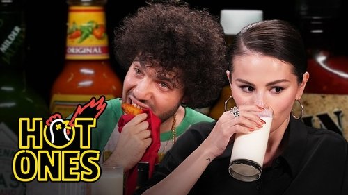 Background image for Selena Gomez and Benny Blanco Burn With Love While Eating Spicy Wings