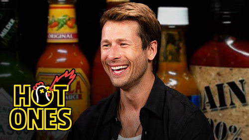 Background image for Glen Powell Needs a Wingman While Eating Spicy Wings