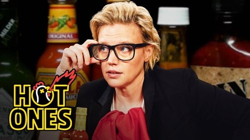 Background image for Kate McKinnon Gets Weird While Eating Spicy Wings