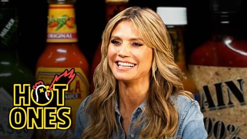 Heidi Klum Strikes a Pose While Eating Spicy Wings