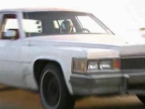 Nile's Cadillac DeVille sedan