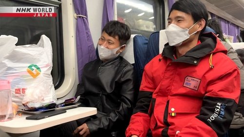 Background image for Trains Carry Workers Home After Zero-COVID: China