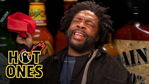 Background image for Questlove Refuses Defeat While Eating Spicy Wings