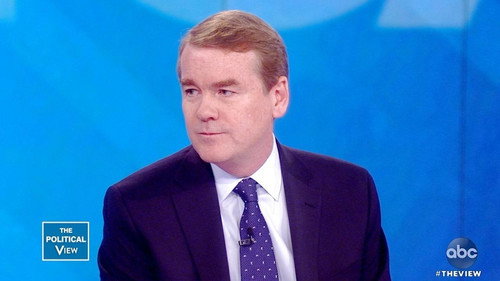 Michael Bennet and Katie Couric still