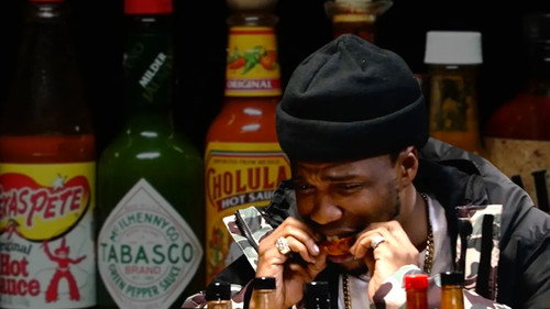 Hot Ones Season 2 Episode 1 - Curren$y Talks Munchies, Industry Games, and Rap Dogs While Eating Spicy Wings