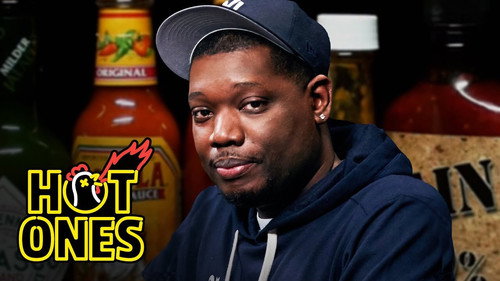 Hot Ones Season 15 Episode 9 - Michael Che Gs Up While Eating Spicy Wings
