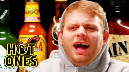 Mac DeMarco Tries to Stay Chill While Eating Spicy Wings